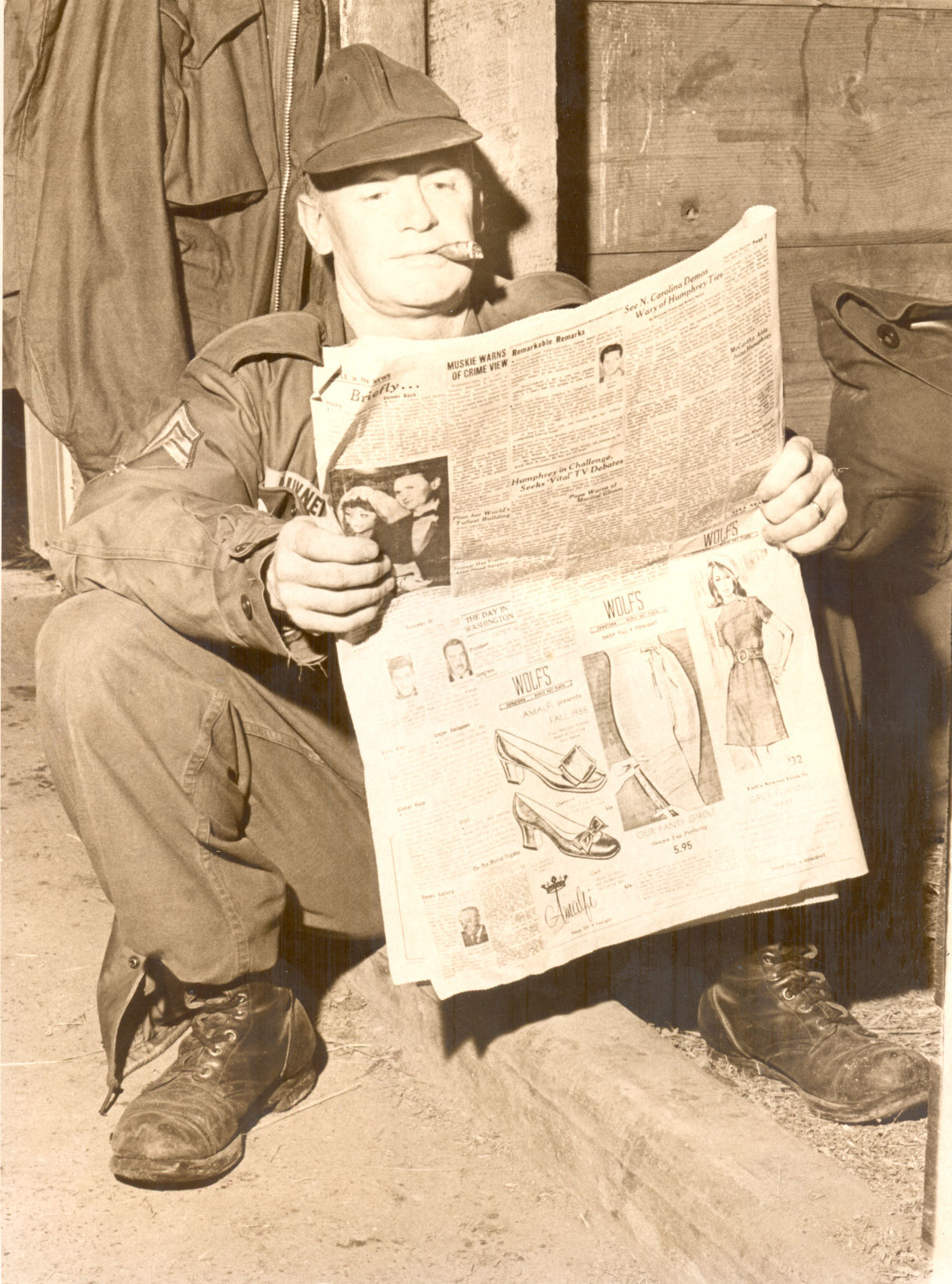 National Guard reading the paper: Waterloo riot of Sept. 13, 1968